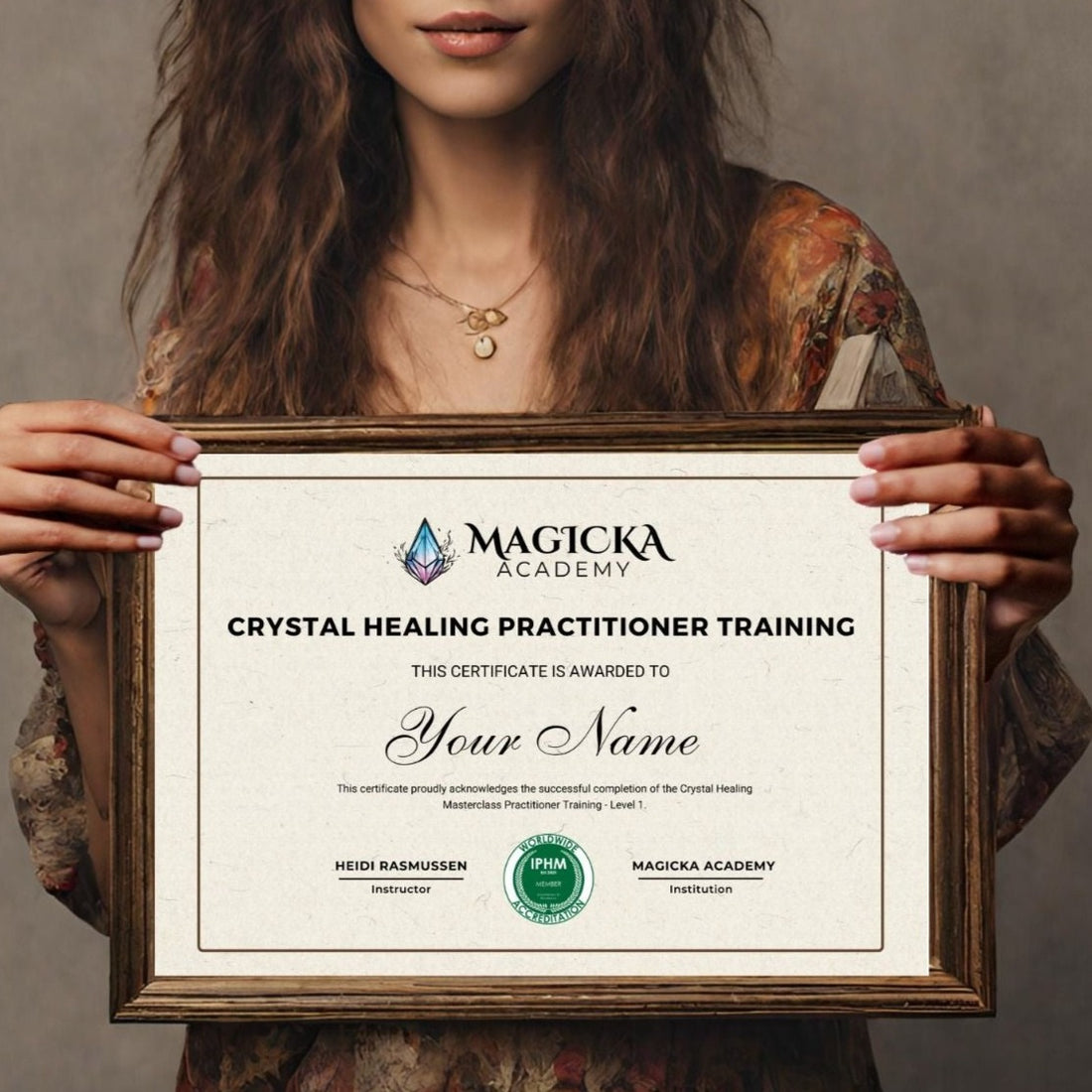 A woman holding a framed Magicka Academy Crystal Healing Practitioner Training certificate