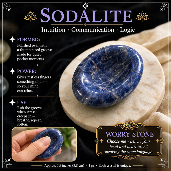 Sodalite worry stone: navy blue streaked with white, with a thumb groove